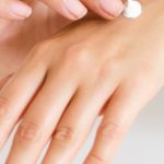 Nail Care - Woman Applying Lotion on Hand
