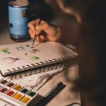 Hobby - Person Writing Illustration in Spiral Notebook
