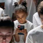 Advancement - Photo of People Engaged on their Phones