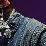 Accessorizing - Man in Silver Wreath with Flowers and Pendants