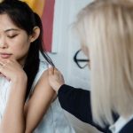 Mental Wellness - Young Woman Being Consoled